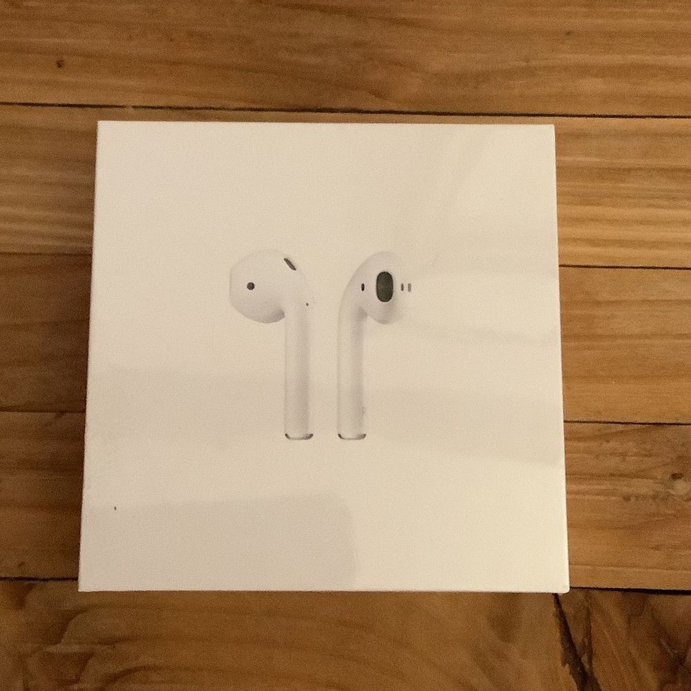 Apple AirPods with Charging Case (2nd
Generation) New in Factory Sealed Box